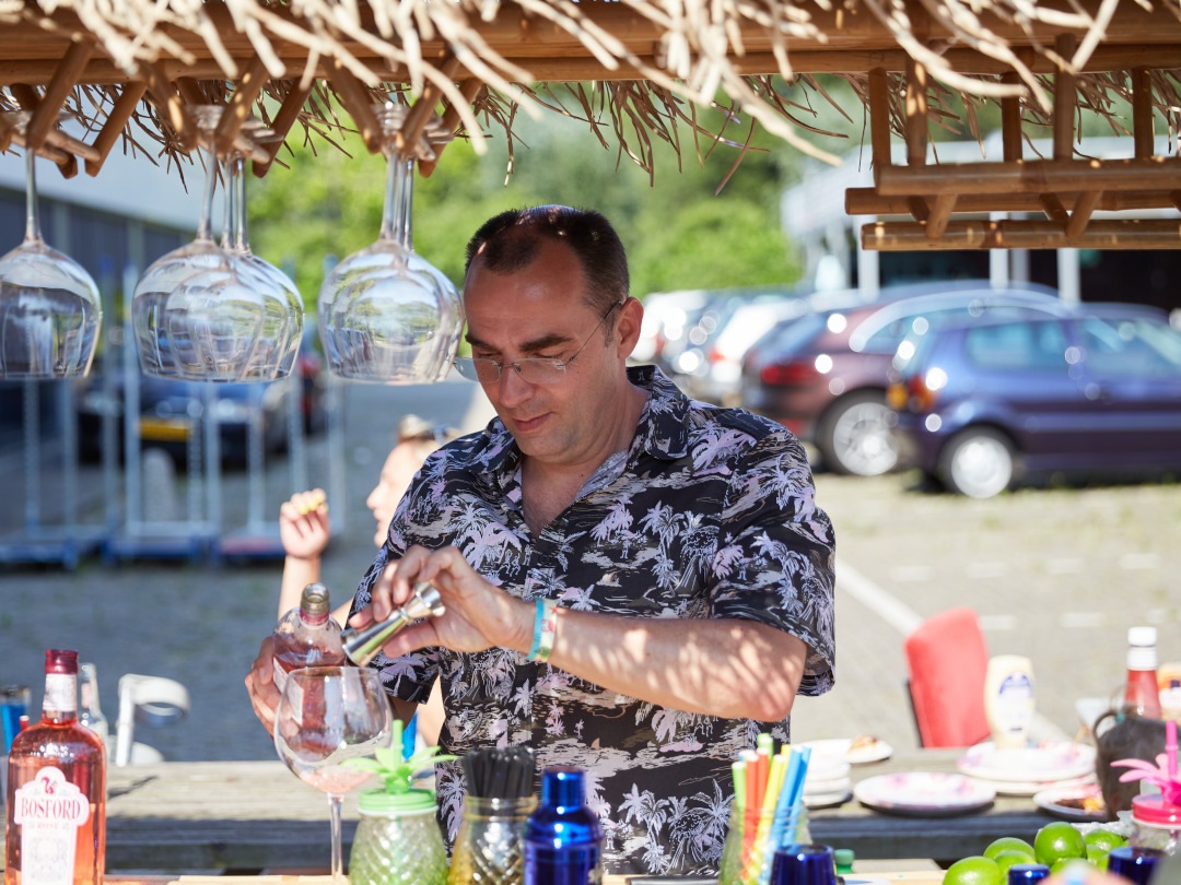 One of our founders, Bart van Mierlo during the Curaçao beach party in our parking lot, summer of 2020