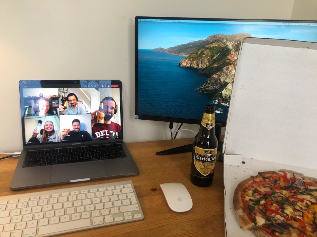 Photo impression of Young S[&]T with a pizza and a beer, during their online meeting
